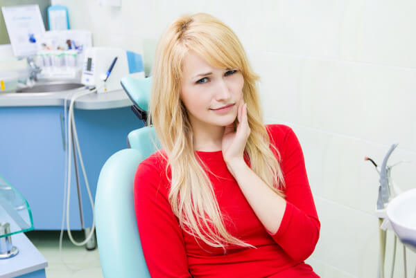 patient sitting in dentist's chair in Richardson, TX